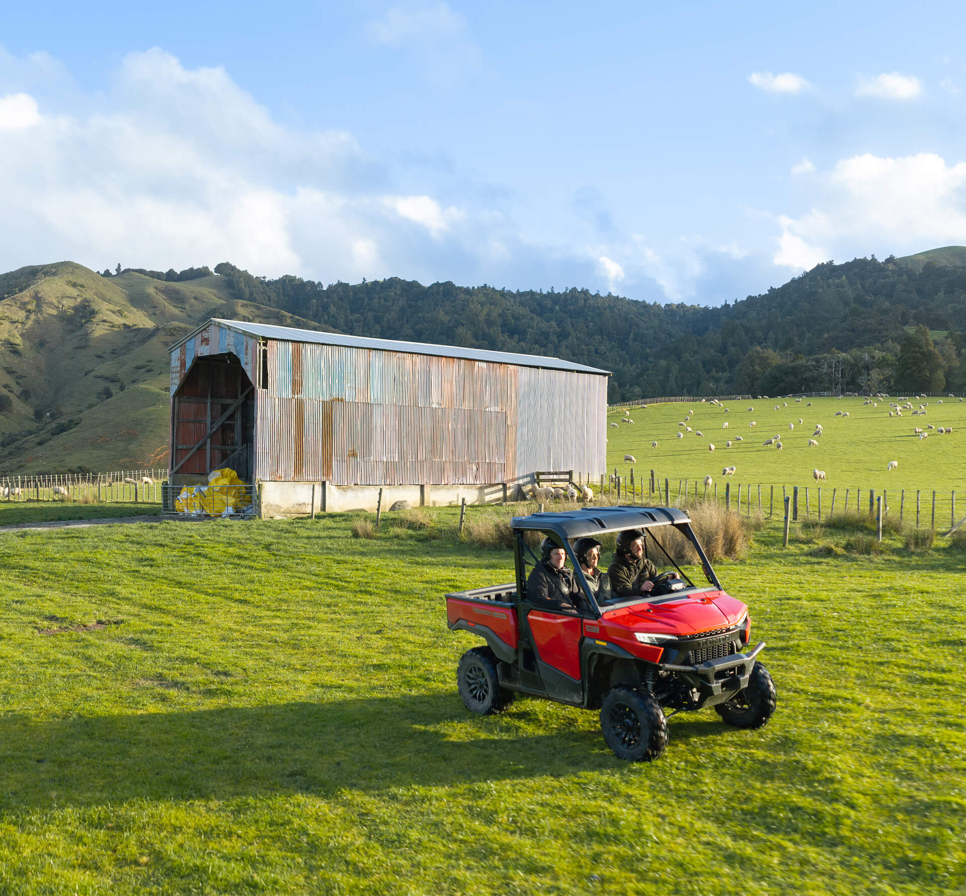 Honda Pioneer 1000 holding a steady speed with cruise control across a paddock