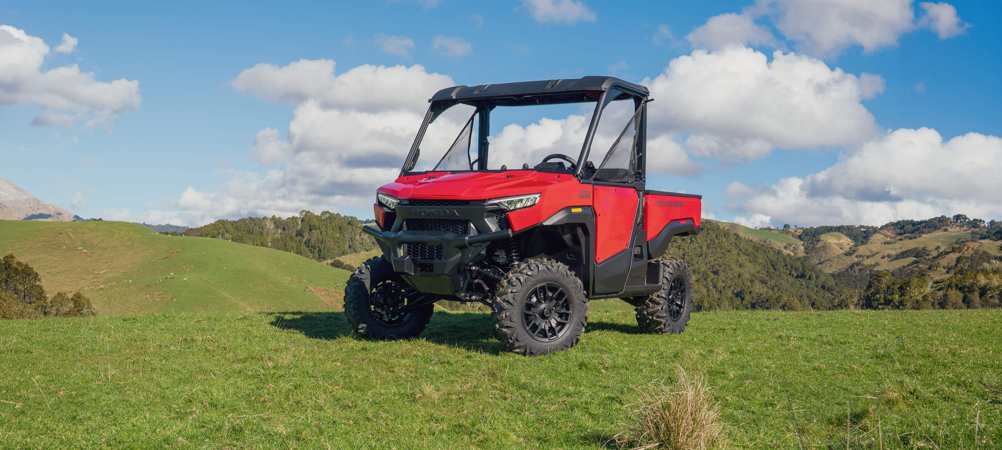 Honda Pioneer 1000 Deluxe front three-quarter product view