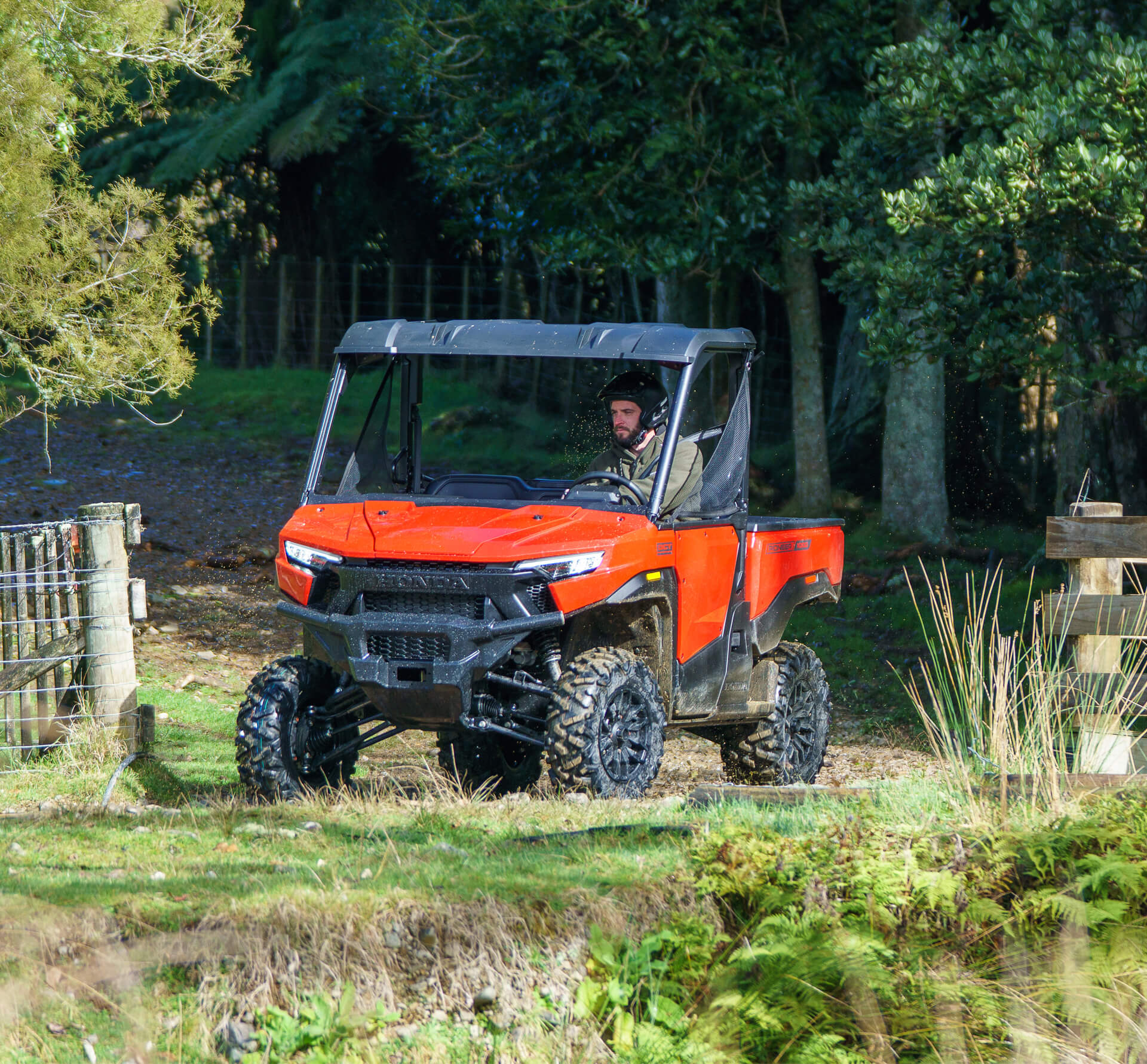 Honda Pioneer 1000 with improved Electric Power Steering handling rough terrain