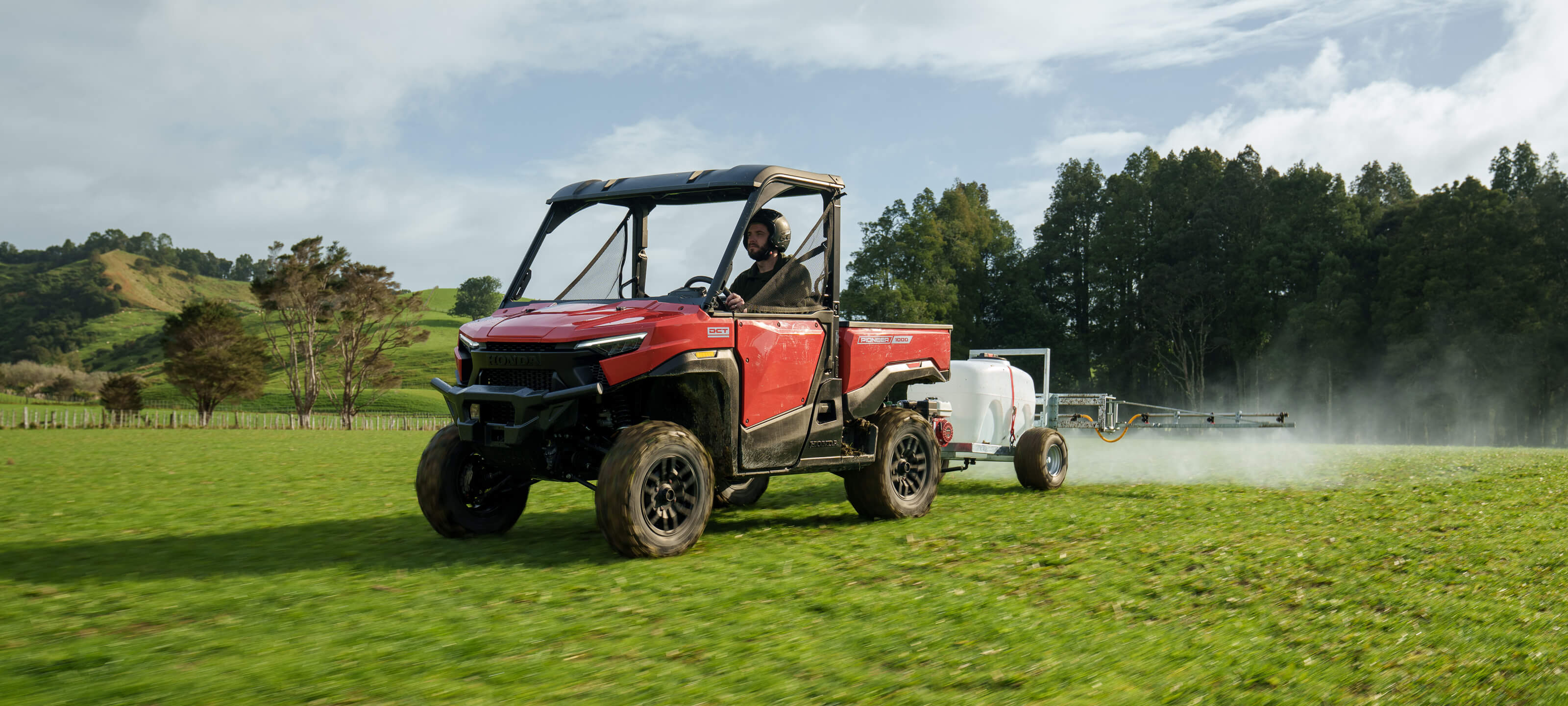 Pioneer 1000 carrying a paddock sprayer